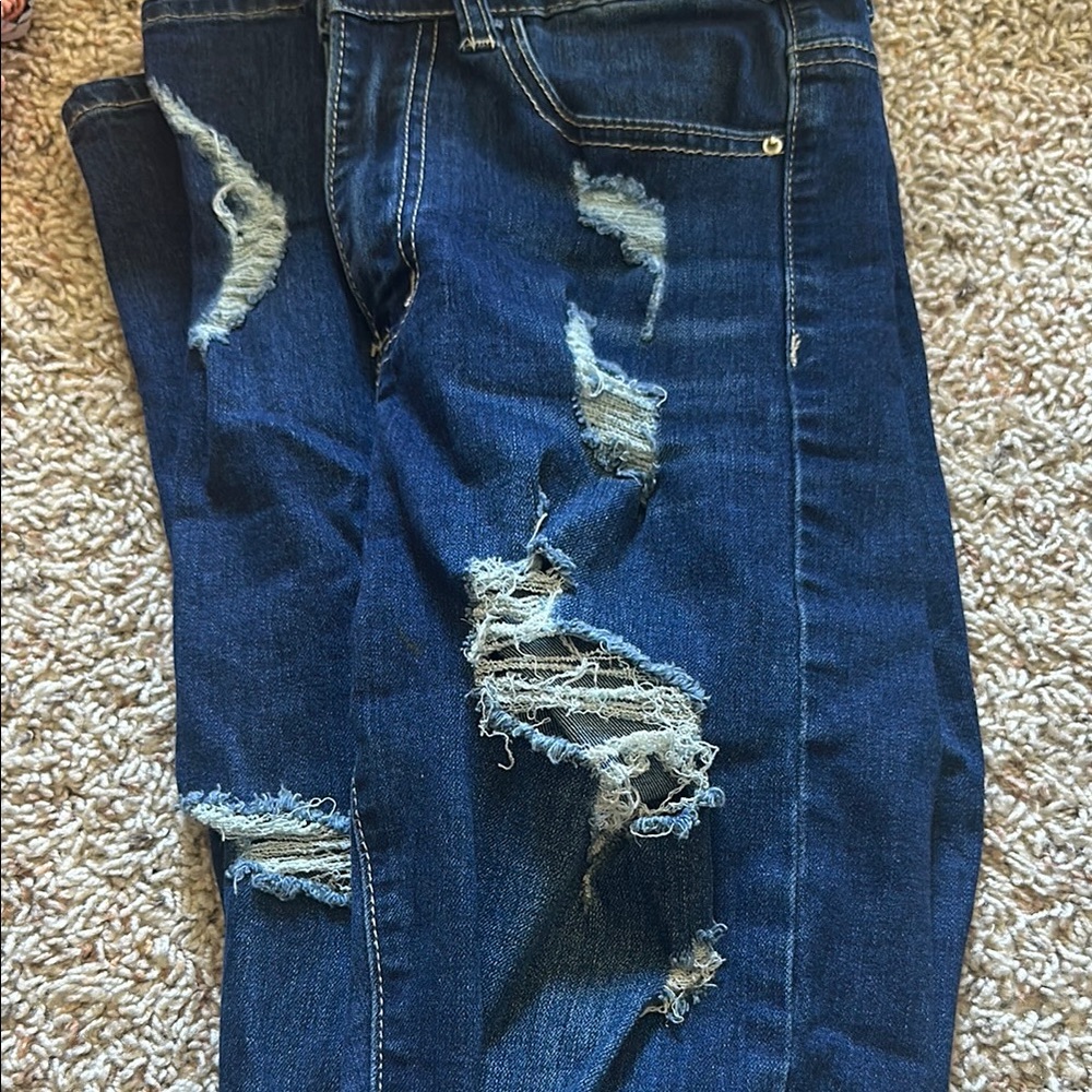 Distressed Blue Jeans